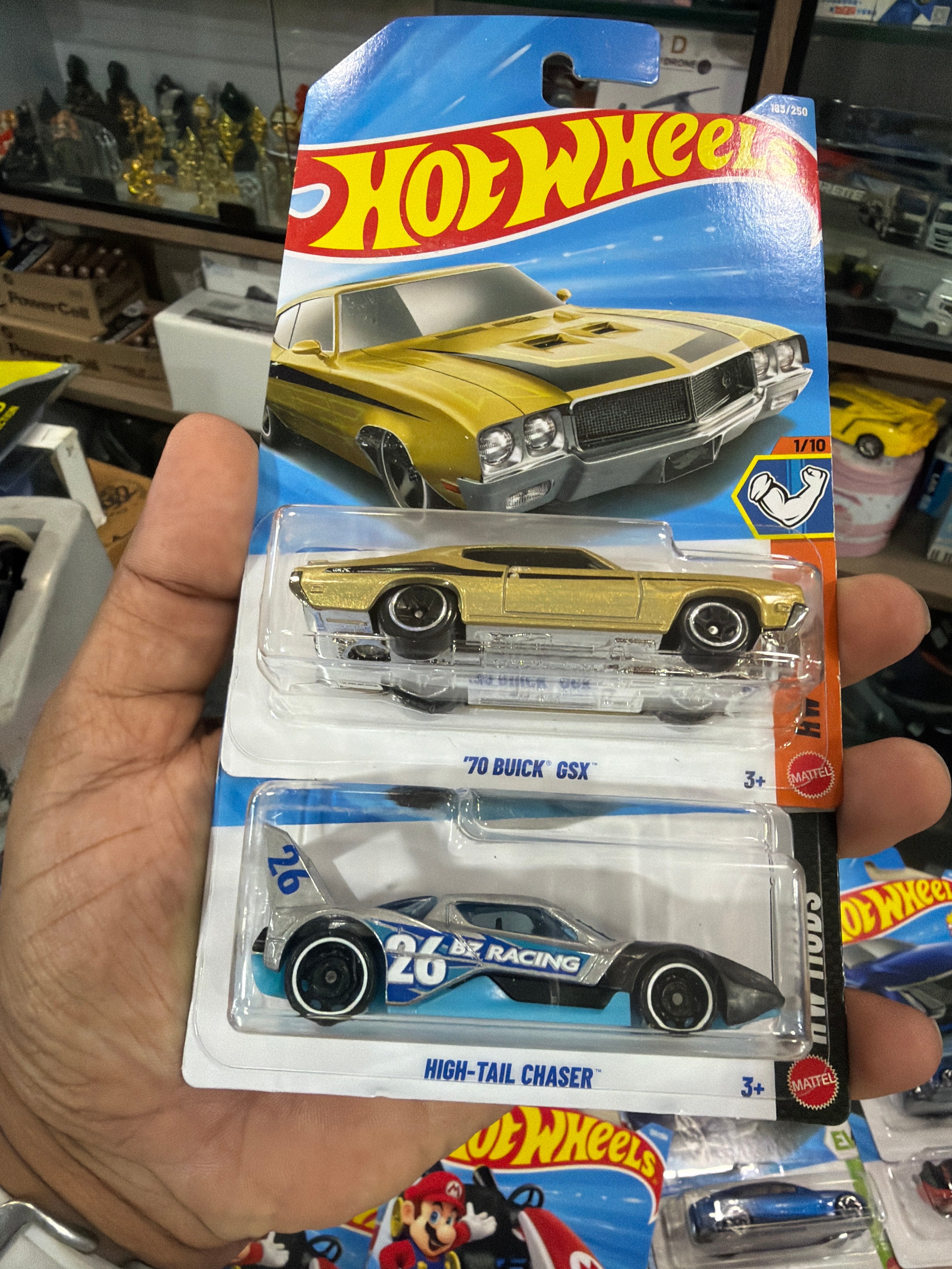 Hotwheels 70 Buick and high tail chaser